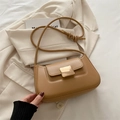 Brown leather baguette shoulder bag with gold buckle and stylish knot detail strap - Khaki