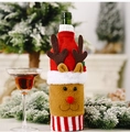 Detail of knitted Christmas reindeer wine bottle cover with 3D nose and festive plush trim - Elk