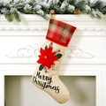 Linen Christmas stocking with red poinsettia and Scottish plaid cuff on a fireplace - Poinsettia Large Flower Style (4618538434944)