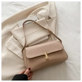 Close-up of beige PU leather shoulder bag with a sleek gold metal twist lock buckle - Dark Khaki