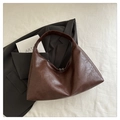 Dark brown tote bag in oil-wax texture with spacious design and wide shoulder strap - Brown