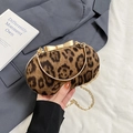 Elegant leopard print oval evening clutch bag with golden bow clasp and metal chain handle - Brown