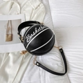 Chic black basketball-shaped leather crossbody bag with white cursive logo and gold chain - Black