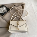 Elegant cream lychee pattern handbag with gold clasp and adjustable strap for women - White
