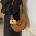 Retro brown hobo shoulder bag with litchi texture and cute plush pendant charm - Brown