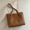 Brown large capacity tote bag with adjustable gold buckle straps and fashion logo - Tan