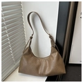 Detail of coffee brown faux suede bag showing smooth zipper and adjustable strap buckle - Khaki