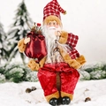 Standing Santa figurine in red plaid coat with brown fur trim holding gift bag - Sitting Style With Oil Lamp