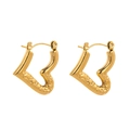 Detail of gold heart earrings showing hammered texture and secure clicker closure - Hammered V-Heart (CBGE0014) / Gold