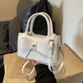 Elegant white matte leather handbag with large bow and crystal heart charm detail - Off White