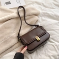 Dark brown rectangular flap shoulder bag with gold metal twist lock in a vintage style - Brown