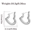 Orecchini a cuore in argento lucido con specifiche di misura su sfondo bianco - Cuore立体 Grande (CBGE0017) / Argento