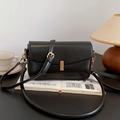 Classic black leather underarm bag with gold metal clasp and adjustable strap - Black