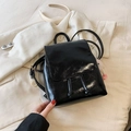 Mini black patent leather backpack with drawstring closure and pink fur ball charm - With Pendant / Black