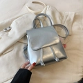 Metallic silver mini backpack with knotted drawstring and sleek mirror finish - With Pendant / Silver