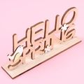 Décoration de table Hello Spring en bois sculpté avec fleurs blanches et petit oiseau - Style Hello Spring