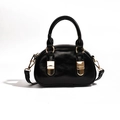 Glänzende schwarze Bowling-Handtasche mit Goldakzenten und abnehmbarem Schultergurt - Schwarz