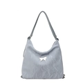 Hobo shoulder bag in light blue faux leather with silver butterfly and pleat details - Blue