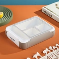 Beige and white four-compartment lunch box with a frosted lid on a desktop - 800ML / Gray