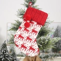 Red and white knitted Christmas stocking with reindeer pattern and decorative pom poms - Elk Style
