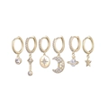 Set of six gold moon and star dangle earrings featuring sparkling cubic zirconia studs - Star Moon Saturn Celestial Pendant Set (S-E1611)