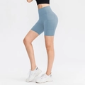 Light blue high waisted yoga shorts with side pockets for fitness and training - Aqua