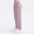 High-waist loose yoga pants in light purple with side pockets and wide-leg design - 4/S / Bottoms / Light Purple