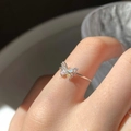 Chic silver butterfly ring with colorful zircon crystals shown on finger - Adjustable Open / Butterfly Fairy Style