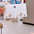 Three-piece gold star earring set featuring rhinestone studs and polished star pendants - 3-Pair Starburst Rhinestone Fashion Stud Collection(S-E1759) / Gold