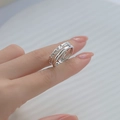 Elegant double-layered silver ring featuring a mix of polished and textured braided bands - Adjustable Open / White Gold