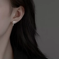 Minimalist S925 sterling silver lava drop earrings on model in bright silver finish - Lava Water Drop Studs (S-E1905) / Silver