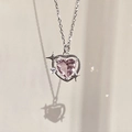 Close-up of S925 silver heart necklace featuring pink zircon and star-shaped accents - Pink Heart Hollow Necklace
