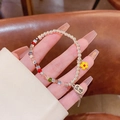Detail von S925 Silberperlen-Armband mit bunten Kristallen und gelbem Blumenanhänger - Glücksblumen-Perlenarmband