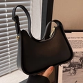 Minimalist black crescent hobo shoulder bag with matte leather and gold hardware - Black