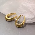 Chic gold-plated U-shaped hoop earrings with a high-shine mirror finish and engraved detail - Gold Thick Oval U-Hoops (CELINZ PARIS) (ED2008-2)
