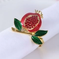 Pomegranate napkin ring with red enamel and rhinestones on a white linen napkin - Pomegranate Style (WZW-PNR-1527)