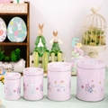 Set of four pink Easter bunny tin storage boxes with polka dots in a festive display - Pink Rabbit Theme Set