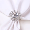 Silver sunflower napkin ring with crystal centerpiece on elegant white silk fabric - Silver Sunflower Napkin Ring
