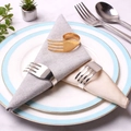 Polished gold and silver fork-shaped metal napkin rings on plates in a dining setting - Gold and Silver (ZWZ-RNP-270)