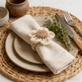 Handmade raffia sunflower napkin ring with woven petals on natural hemp rope loop - Beige Linen Flower