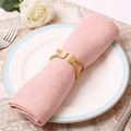 Elegant gold mesh elastic napkin ring set on a pink napkin for refined dining decor - Gold