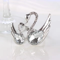 Elegant silver double swan napkin ring with sparkling crystals and a mirrored reflection - Silver Double Swan (ZWZ-ANR-097)