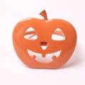 Detail view of glossy orange Jack-o'-lantern pumpkin napkin ring for Halloween table decor - Orange Hollow Out Jack-O'-Lantern Style