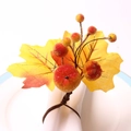 Autumn napkin ring with crystal beads maple leaves and orange pumpkin berries on white plate - Simulated Frosted Pumpkin Style