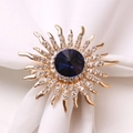 Golden sunflower napkin ring with royal blue crystal and sparkling white rhinestones - Gold Glass Stone Style
