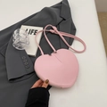 Bolso bandolera mini en forma de corazón para mujer en rosa suave con nudos decorativos - Rosa