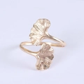 Elegant gold ginkgo leaf napkin ring with detailed metallic texture on white background - Iron / Gold