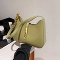 Minimalist avocado green crescent shoulder bag with golden chain detail and soft PU finish - Green
