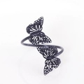 Eleganter schwarzer Doppelschmetterling-Serviettenring mit filigranem Design für Hochzeiten - Schwarz
