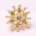 Gouden servetring met witte parels en strassteentjes voor elegante tafeldecoratie - Gewone Parel